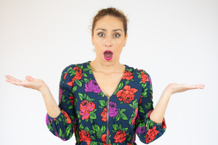 Beautiful young woman caucasian very surprised over isolated white backgroundの写真素材