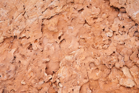 Natural texture of the rock part. Red floor cracked surface. Pictures from seriesの写真素材