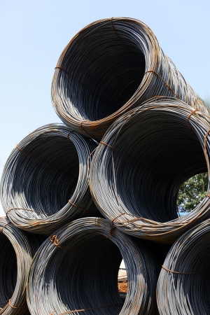 Bundles of steel stacked together の写真素材