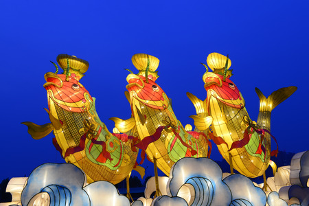 Three lamps of carp shape will light the lanterns at the entrance to the parkのeditorial素材