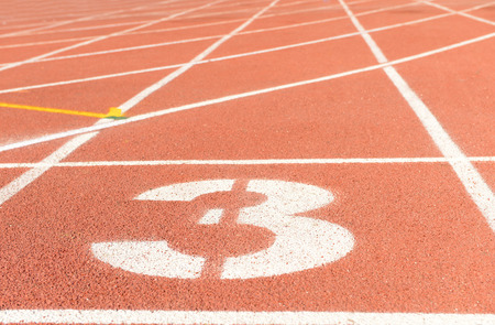 The plastic runway on the sports ground, close-upの写真素材