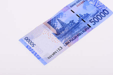 Rupiah note on white background