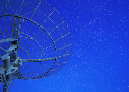 Observatory equipment in the sky in the backgroundの写真素材