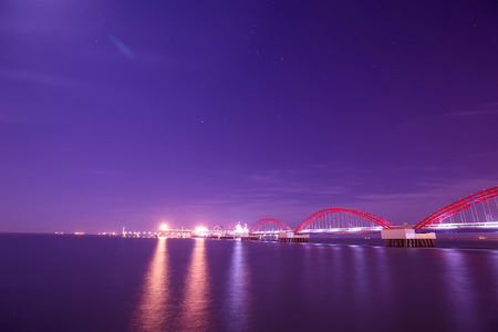 The freighter dock on the sea bridge at night
