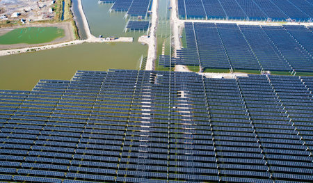 Drones capture on-site construction of photovoltaic panelsの写真素材