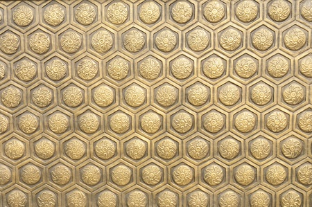 The door with bronze, carving delicate beautiful decorative pattern