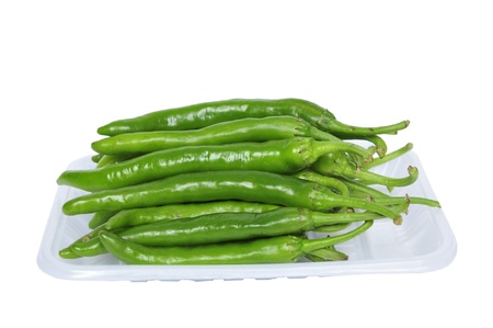 On a white background of green pepper の写真素材