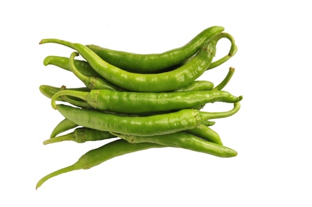 On a white background of green pepper  の写真素材