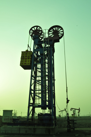 Oil drilling rig, tanghai county of hebei province oil fields in Chinaの写真素材