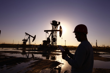Oil drilling exploration, the oil workers are workingのeditorial素材