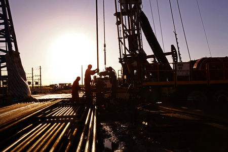Oil drilling exploration, the oil workers are workingのeditorial素材