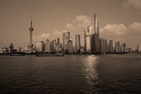The Oriental pearl tower, Shanghai world financial center jinmao tower and the Shanghai skylineのeditorial素材