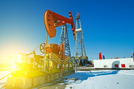 Oil pump, oil industry equipment in the snow