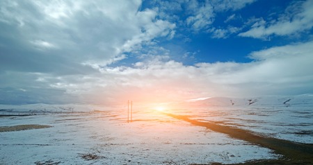 Snow mountain landscape of the grasslandsの写真素材