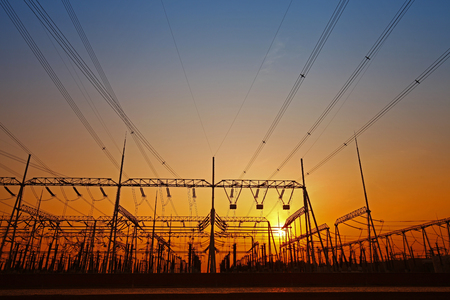 Wire electrical energy at sunsetの写真素材