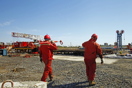 Oil drilling exploration, the oil workers are workingの写真素材