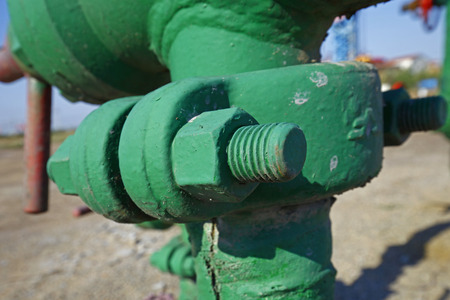 The bolts and nuts on the industrial equipmentの写真素材