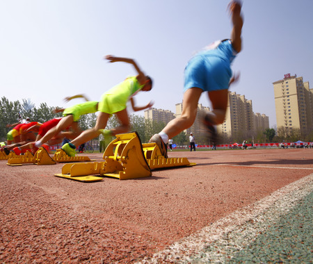 The sports meeting, the athletes began to sprint raceのeditorial素材