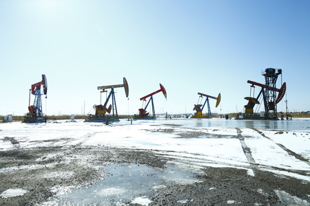 Oil pump, oil industry equipment in the snowのeditorial素材