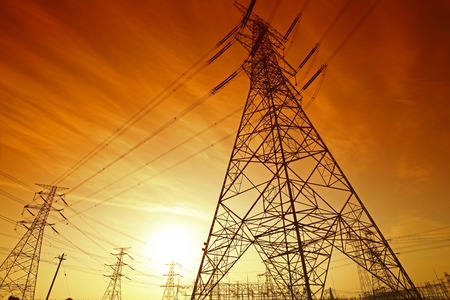 Wire electrical energy at sunsetの写真素材