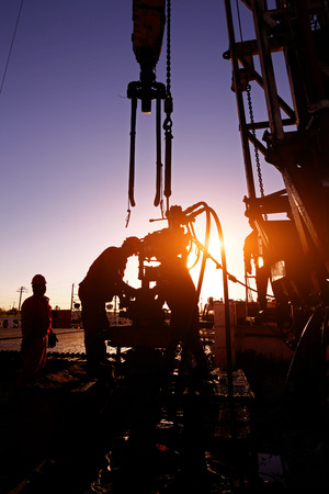 Oil drilling exploration, the oil workers are workingのeditorial素材