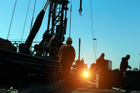 drilling exploration, the oil workers are workingの写真素材