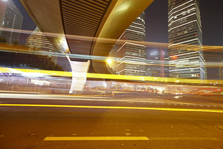 the light trails on the modern building background in shanghai china