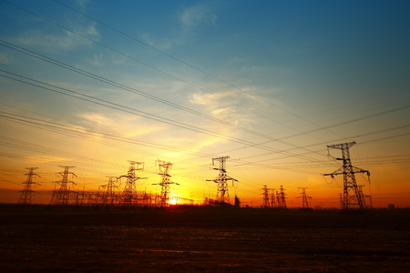 Wire electrical energy at sunsetの写真素材