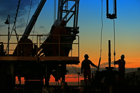 the oil workers are workingの写真素材