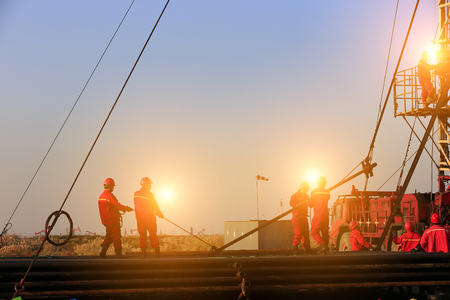 the oil workers are workingのeditorial素材