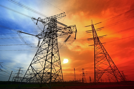 Electric tower silhouette at sunsetの写真素材