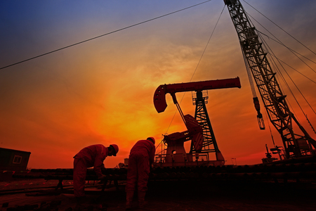 the oil workers are workingの写真素材