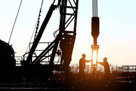the oil workers are workingの写真素材