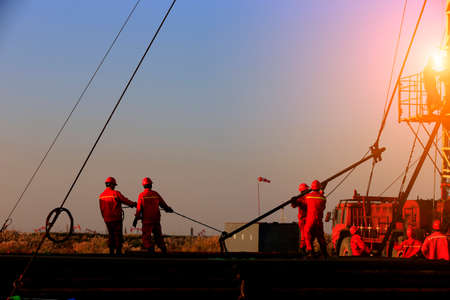 the oil workers are workingの写真素材