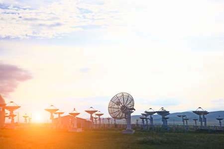 Radio telescope observatory and the blue sky white cloudsの写真素材