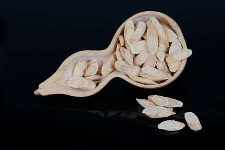 Chinese herbal medicine astragalus membranaceus on a white background, close-up picturesの写真素材