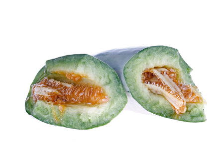 Melon on a white background, shot from close rangeの写真素材