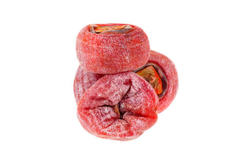 Dried persimmon on a white backgroundの写真素材