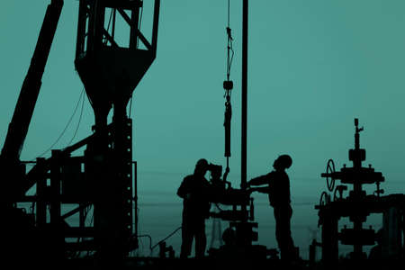 the oil workers are workingの写真素材