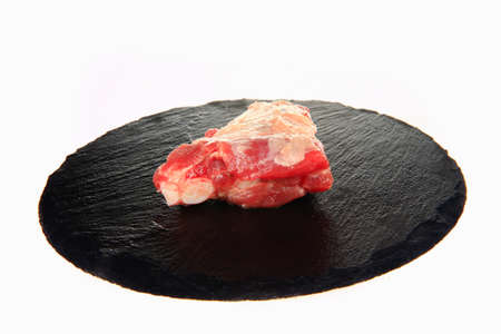 Fresh pork chop on a white background, close-up shotの写真素材