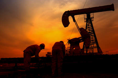 the oil workers are workingのeditorial素材