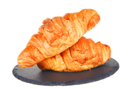 Croissants in the background, fresh baked bread snacksの写真素材