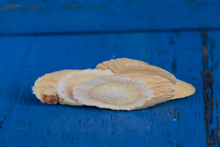Chinese herbal medicine astragalus membranaceus on a white background, close-up picturesの写真素材
