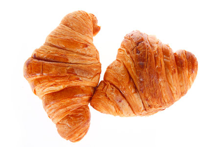 Croissants in the background, fresh baked bread snacksの写真素材