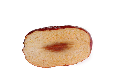 Red dates isolated on a white background, shot up closeの写真素材