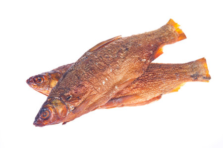 Grilled fish on a white background.の写真素材