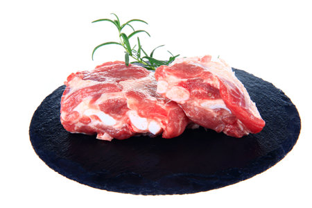 Fresh pork chop on a white background, close-up shotの写真素材