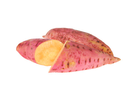 Fresh ripe sweet potatoes on a white backgroundの写真素材