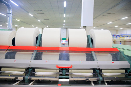 The cotton group is in the spinning production line factory, very clean and tidyの写真素材