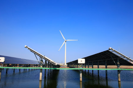 The power plant has rows of solar photovoltaic panels for producing clean electricity. The concept of zero-emission renewable electricityの写真素材